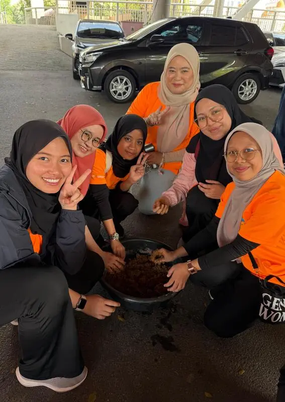 365 Group team members taking part in the EM mudball activity